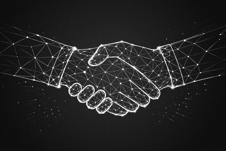 Two hands shaking in a wireframe style, symbolizing partnership.